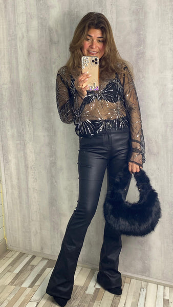 Top transparente con pedrería plateada