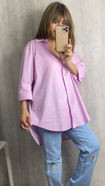 Camisa rosa bebé asimétrica