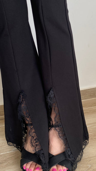 Pantalón negro de punto elástico campana