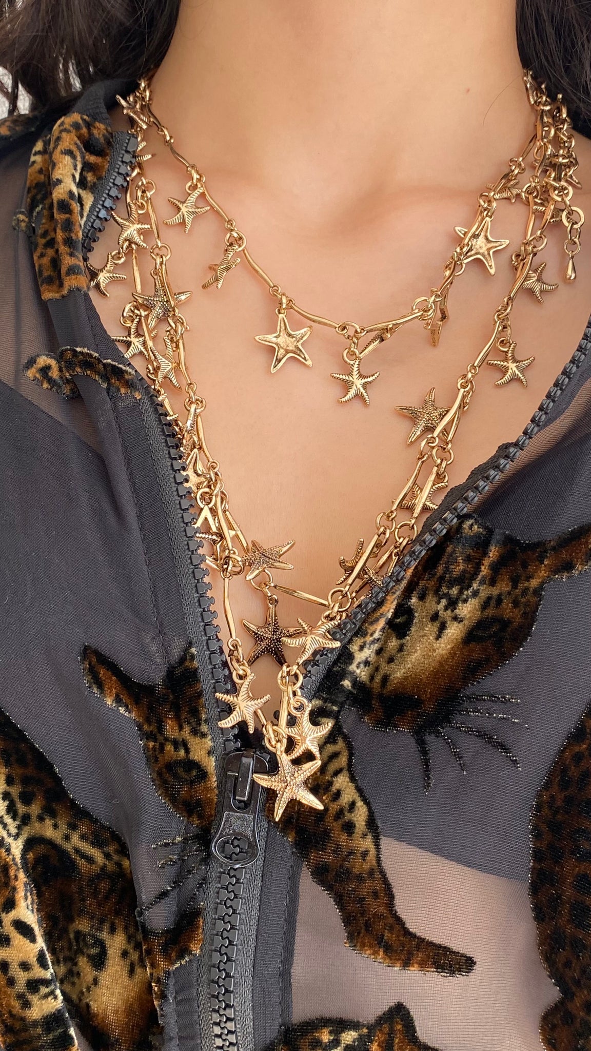 Collar estrella dorado efecto tres en uno