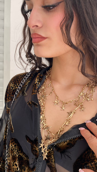 Collar estrella dorado efecto tres en uno