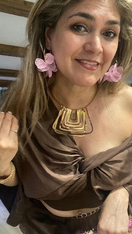 Aros de acero con flores rosa bebé