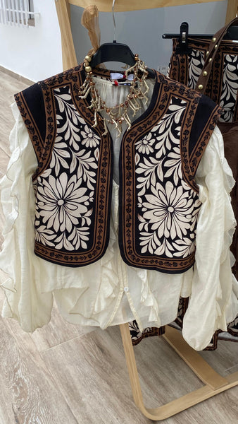 Blusa blanco roto con volantes