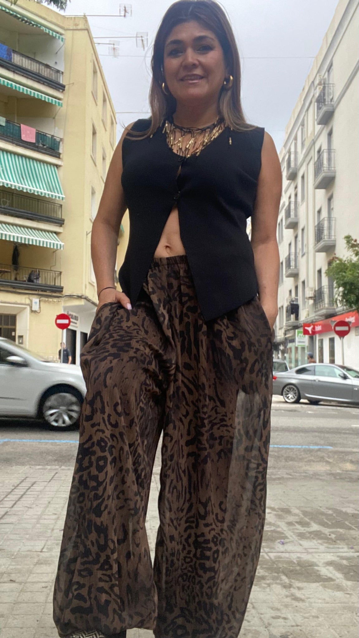 Chaleco de punto elástico abotonado