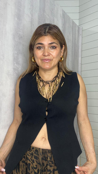 Chaleco de punto elástico abotonado