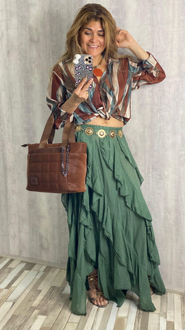 Falda verde botella con volantes asimétricos