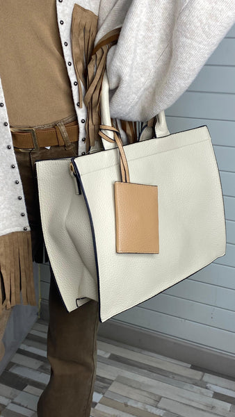 Bolso grande blanco roto de polipiel