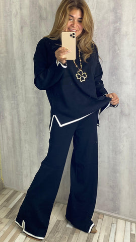 Conjunto de punto de canalé en negro