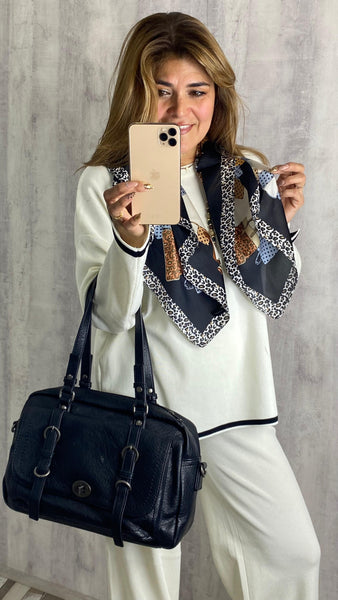 Bolso negro de polipiel con hebillas