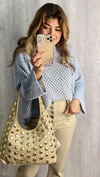 Jersey cachemir azul bebé fondo beige