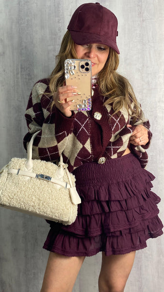 Falda corta con volantes granate