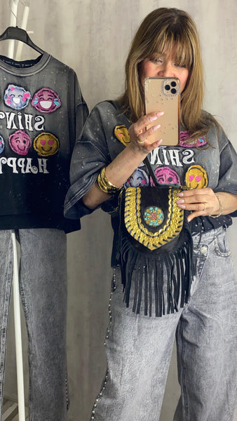 Bolso pequeño con flecos 100% piel