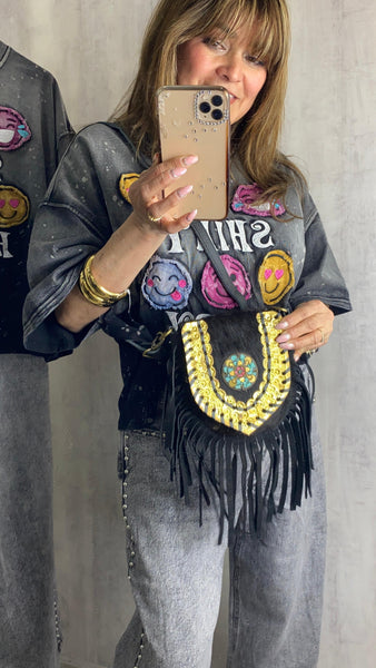Bolso pequeño con flecos 100% piel