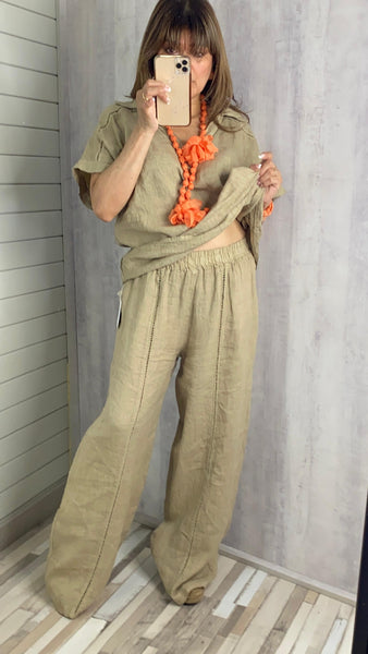 Pantalón de lino beige efecto dorado con detalles de vainicas