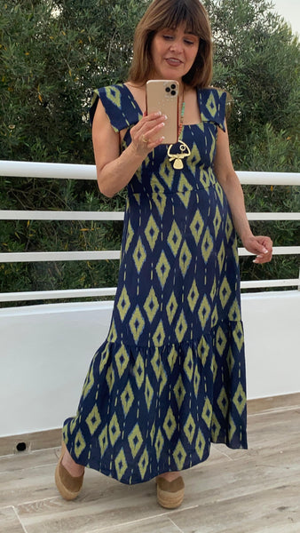 Vestido azul marino y pistacho con nido de abeja en la espalda