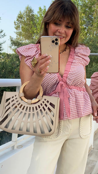 Top vichi rosa con manga abullonada