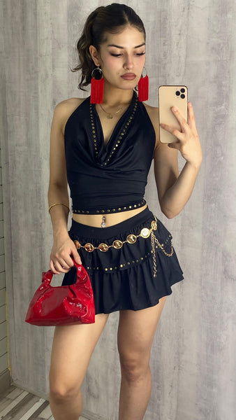 Conjunto negro de punto elástico con tachas